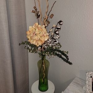 Elegant Green Vase with Floral Arrangement
